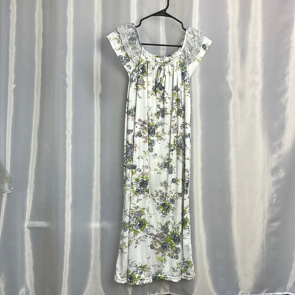 Pretty dress. XL see photos for measurements. New but no tags